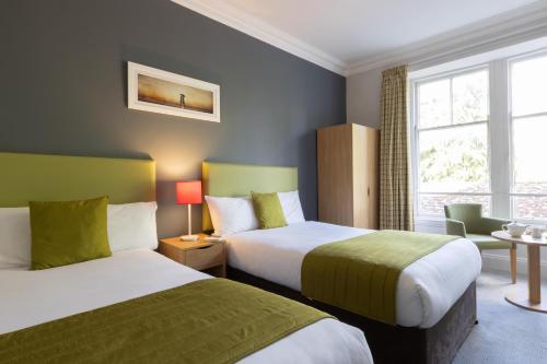 The Pitlochry Hydro Hotelにあるベッド