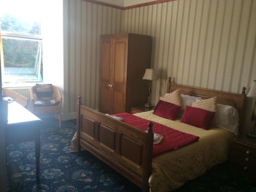 Katil atau katil-katil dalam bilik di Broom Lodge