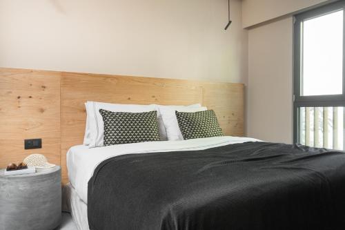 11 Enteka Acropolis Suitesにあるベッド