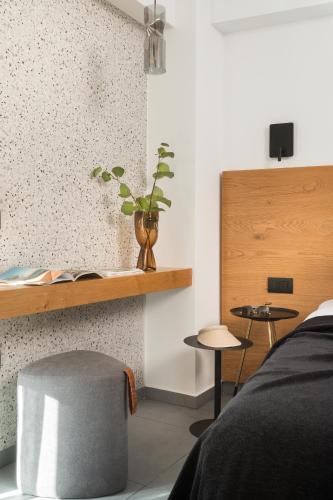11 Enteka Acropolis Suitesにあるテレビまたはエンターテインメントセンター