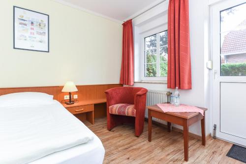 Tempat tidur dalam kamar di Hotel Garni Benser Watt