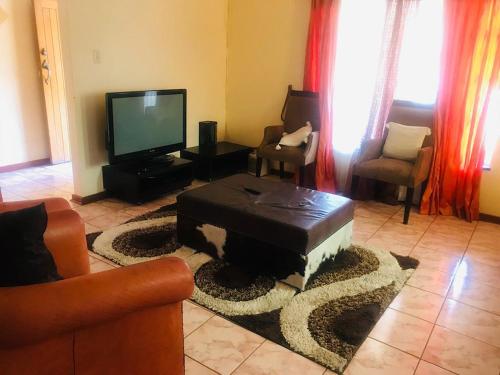 TV/trung tâm giải trí tại Tulo Bed and Breakfast