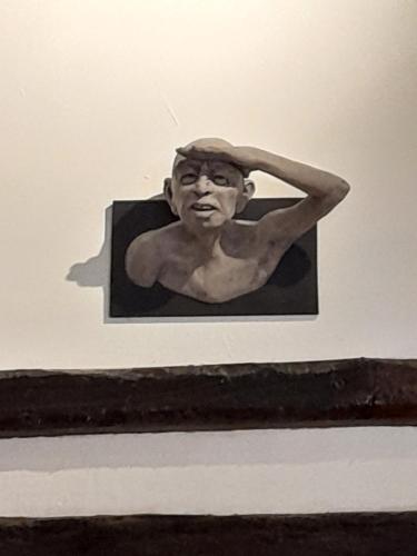 a drawing of a man on a wall at La Grange in Rânes