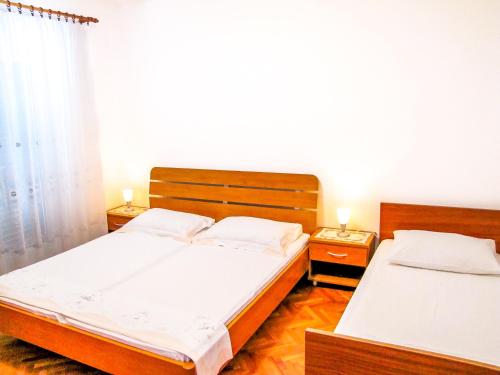 Krevet ili kreveti u jedinici u okviru objekta Apartments Inga