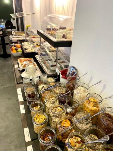 a buffet line with many different types of food at Burghotel Nürnberg in Nürnberg