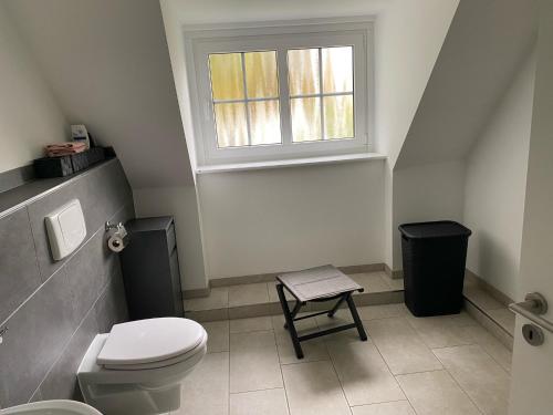Ένα μπάνιο στο Ferienwohnung Falkenfeld