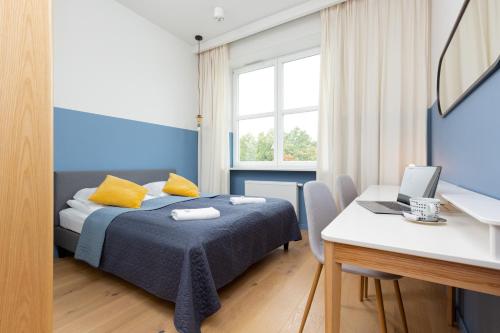 Posteľ alebo postele v izbe v ubytovaní Apartments Warsaw Gagarina by Noclegi Renters