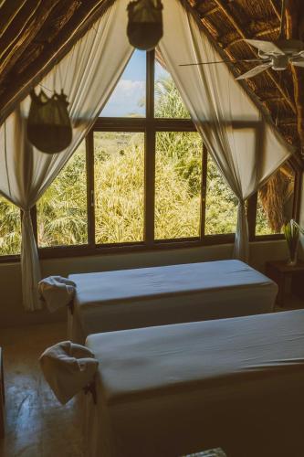 Cama o camas de una habitación en Jashita Hotel