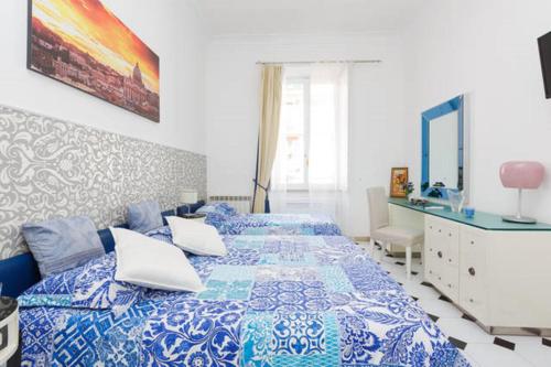 Ein Bett oder Betten in einem Zimmer der Unterkunft Vatican Catone Apartments