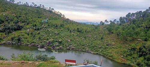 an aerial view of a river in a valley at Ritu Raj Home Stay & Cafe in Malther