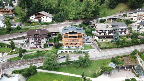 an aerial view of a house in a village at Villa Hubertus in Ortisei