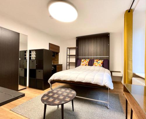 Un pat sau paturi într-o cameră la Auberge de la Pétrusse