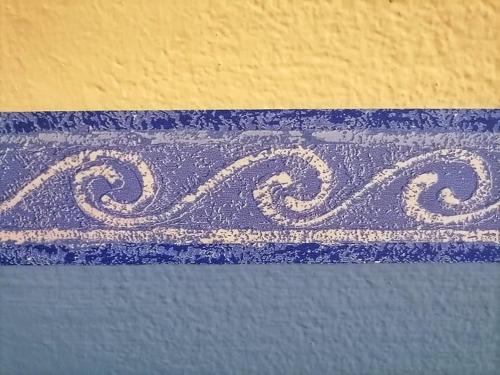 a blue and white stripe on top of a table at Hotel Residence Sant'Anna in Bedonia