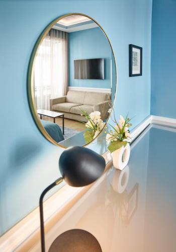 Телевизор и/или развлекательный центр в Hotel Florescente