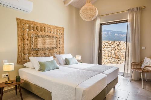 Кровать или кровати в номере Oleanna Villas - Villa Olea
