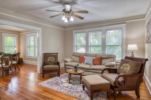 a living room with a couch and a ceiling fan at 16 Saragossa Street B in St. Augustine