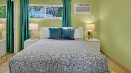 Ένα ή περισσότερα κρεβάτια σε δωμάτιο στο The Beach House - Treasure Island
