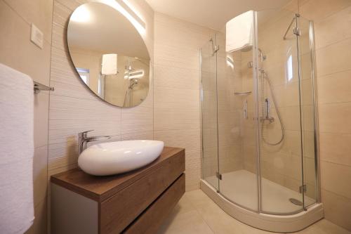 Kúpeľňa v ubytovaní Apartmani Diklo