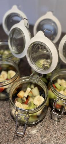 a group of pots and pans with food in them at Lacet House in Ambleside