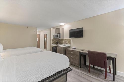 Un ou plusieurs lits dans un hébergement de l'établissement Clarion Pointe Savannah Gateway I-95
