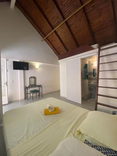 מיטה או מיטות בחדר ב-Residence Bel'Soleil