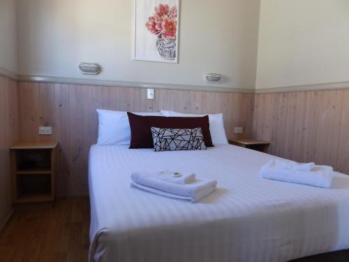 Postel nebo postele na pokoji v ubytování Birubi Beach Holiday Park