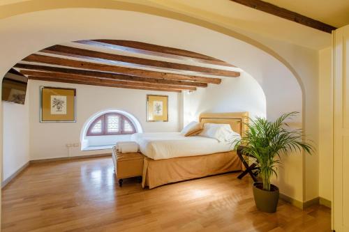Ένα ή περισσότερα κρεβάτια σε δωμάτιο στο Relais Tosinghi