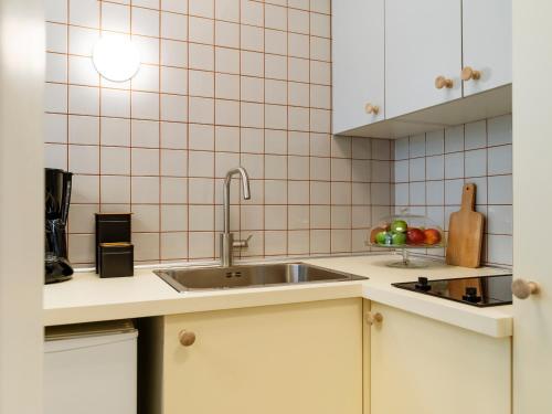Cuina o zona de cuina de Lemon Elegant Old Town Studio