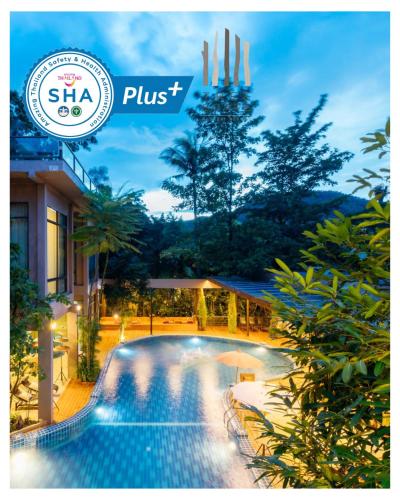 a picture of a swimming pool at a resort at Treescape Resort Chiangmai in Chiang Mai