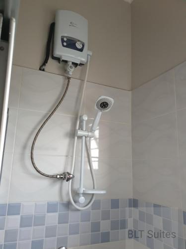 Koupelna v ubytování BLT Suites - Furnished Apartments
