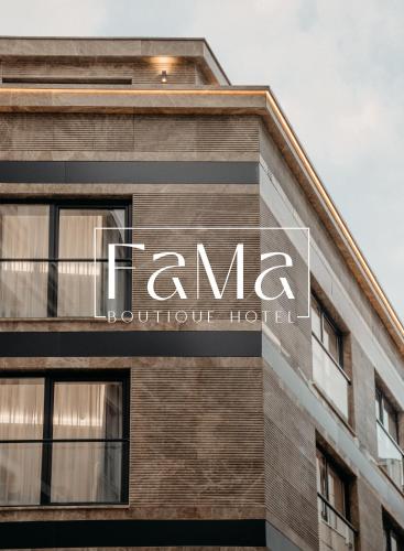 a sign on the side of a building at Fama Karaköy in Istanbul