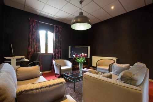 Ruang duduk di Hostellerie St Vincent