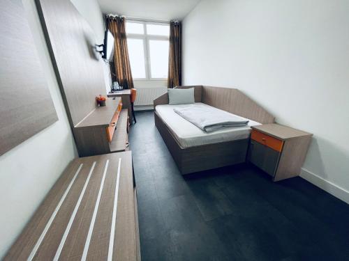Postel nebo postele na pokoji v ubytování Hotel Terminal One