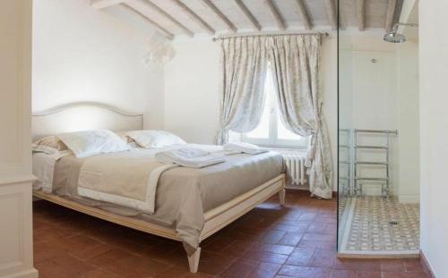 Un ou plusieurs lits dans un hébergement de l'établissement Villa Torre Greve