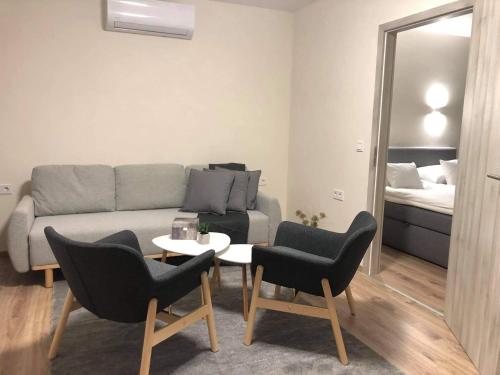 Χώρος καθιστικού στο Brill Hotel Békéscsaba