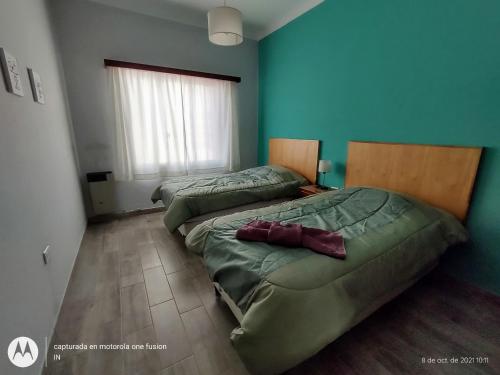 Giường trong phòng chung tại La Casa de la Oma