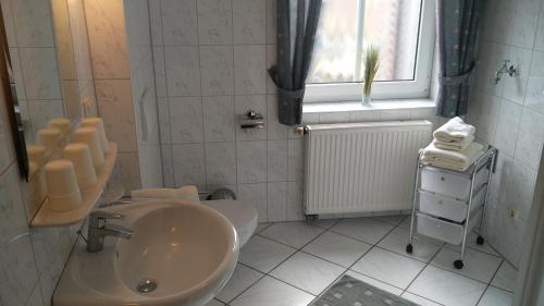 Ванная комната в Ferienwohnungen Peters