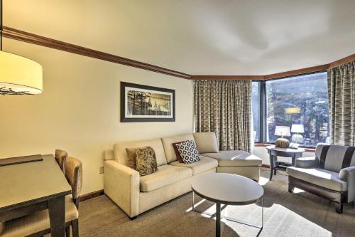 a living room with a couch and a table at 6 Mi to Lake Tahoe Everline Resort Retreat! in Olympic Valley