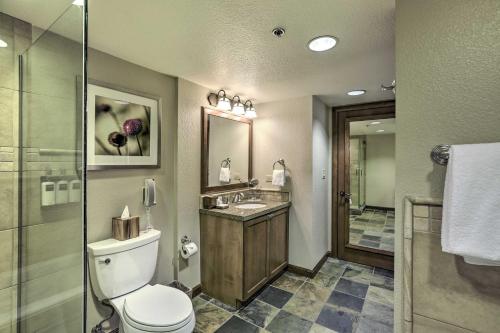 a bathroom with a toilet and a sink and a shower at 6 Mi to Lake Tahoe Everline Resort Retreat! in Olympic Valley