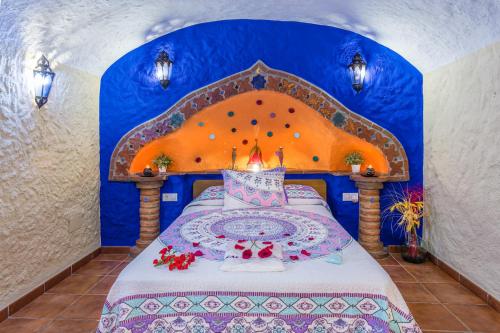 Tempat tidur dalam kamar di Cazorla Casas Cueva