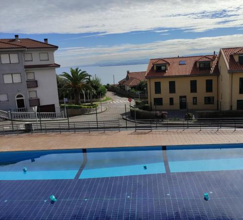 Foto dalla galleria di Espectacular Dúplex con piscina y cancha de padel a Luanco