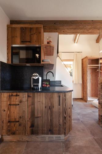 Cuisine ou kitchenette dans l'établissement Hotel Leitenhof 4 Sterne Superior