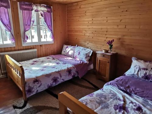 Postel nebo postele na pokoji v ubytování Fontana erdélyi vendégház