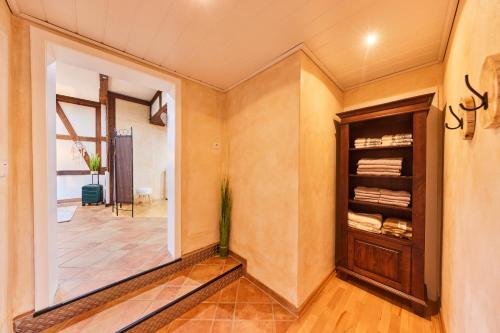a room with a closet and a door to a hallway at Entspannung Pur in Herford
