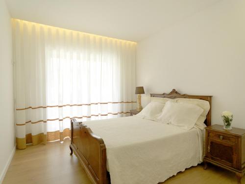 מיטה או מיטות בחדר ב-Casa de Mellares