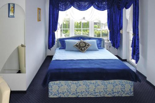 Posteľ alebo postele v izbe v ubytovaní Apartment, Miedzyzdroje