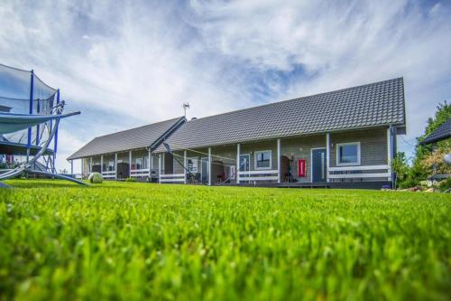 Air-conditioned holiday homes, summer pool, Rewal