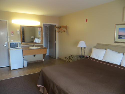 Ένα ή περισσότερα κρεβάτια σε δωμάτιο στο London Travel Inn