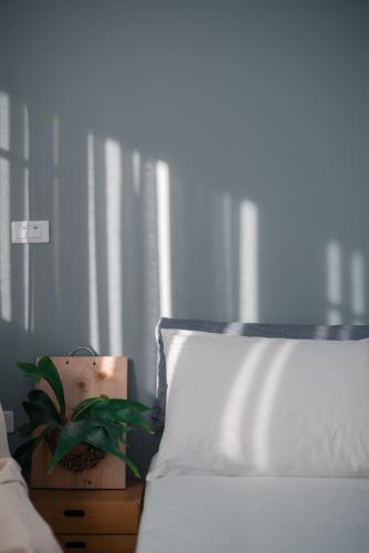 Taitung mini trip hostelにあるベッド