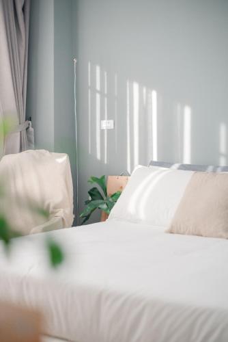 Taitung mini trip hostelにあるベッド